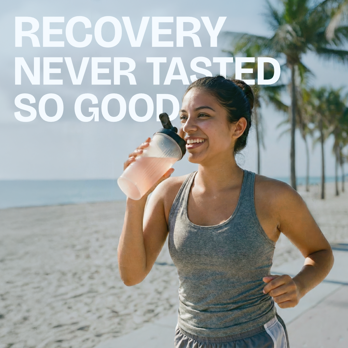 Woman on a beach holding a protein shake with text 'RECOVERY NEVER TASTED SO GOOD' in the background.